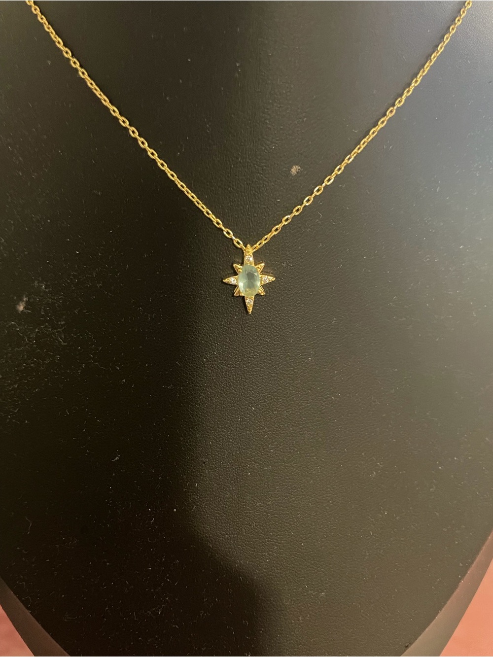 Gold Starburst Necklace with Pale Green Gemstone
